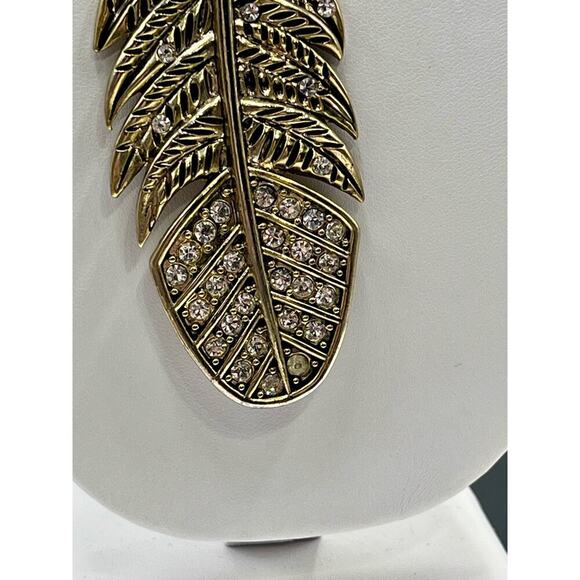 Betsey Johnson Indian Summer Lg
Pave Feather Choker Torque Gold Tone Necklace - Picture 6 of 15